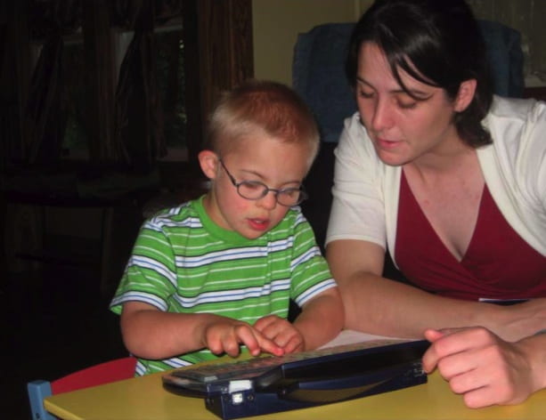 child with teacher