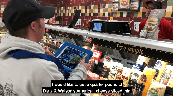 Adult using video VSD app to purchase food
